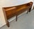 A rare and highly functional piece of mid-century modern bedroom furniture, this Young Manufacturing walnut king headboard...
