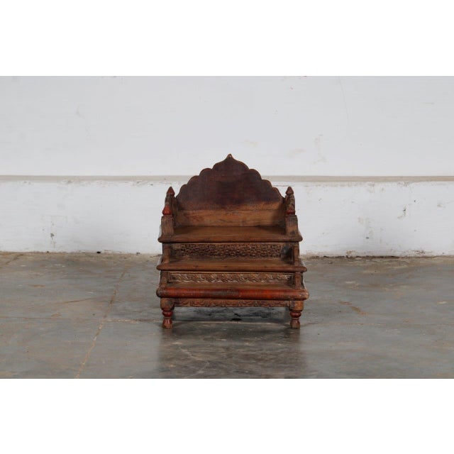 Vintage Indian Teakwood Mandir or Home Temple, with a 3-step terraced design, with a scalloped back, different carvings...