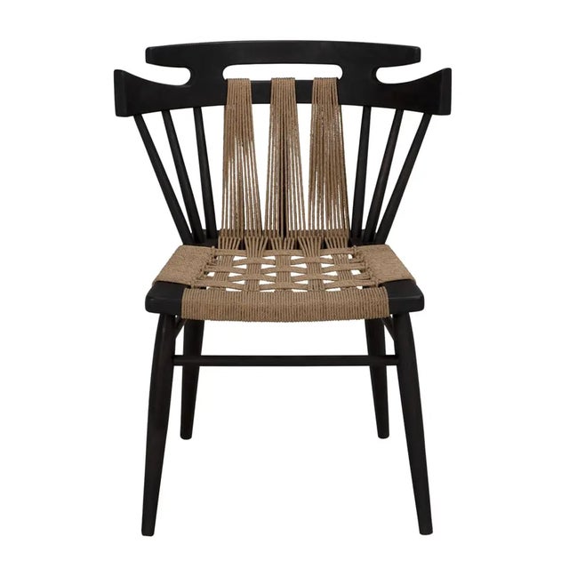 Finished in sleek Black, the Kikki Chair exudes sophistication and modernity, making it a versatile addition to any...
