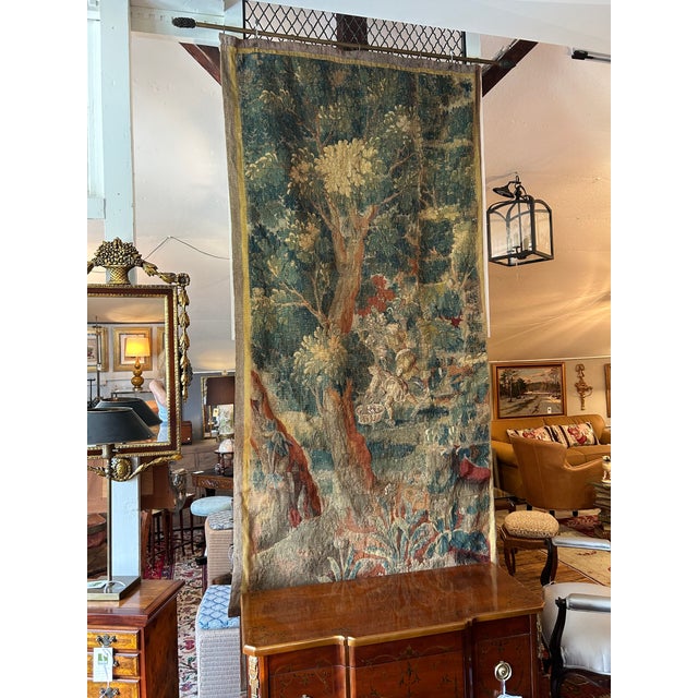 Magnificent and impressive in scale large vertical rectangular antique French Verdure tapestry having pastoral forest...