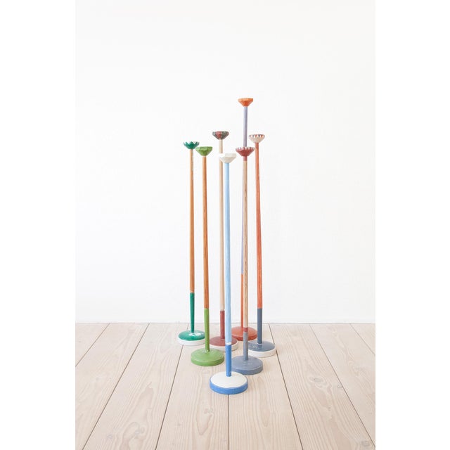 The large candleholders were designed and manufactured by Swedish architect and furniture designer Iwan Näslund in the...
