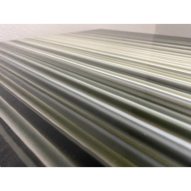 A modern, clean, sophisticated, statement piece, the "barcode" glass top table, Modjulez is designed for the modern home....