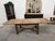 This exceptional 19th-century table has been fully restored. It features a central tabletop measuring 150 cm and two...