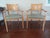 Versatile pair of Biedermeier Chairs upholstered in leather with nailhead trim. We have two pairs available