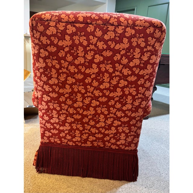 Transitional club/lounge chair with a generous, comfortable silhouette. It has a high back, rolled arms, a deep seat, and...