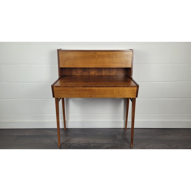 Mid-Century Modern Desk, 1960s, in Worn conditions. Designed 1960 to 1969 This piece is designed in the style of the...
