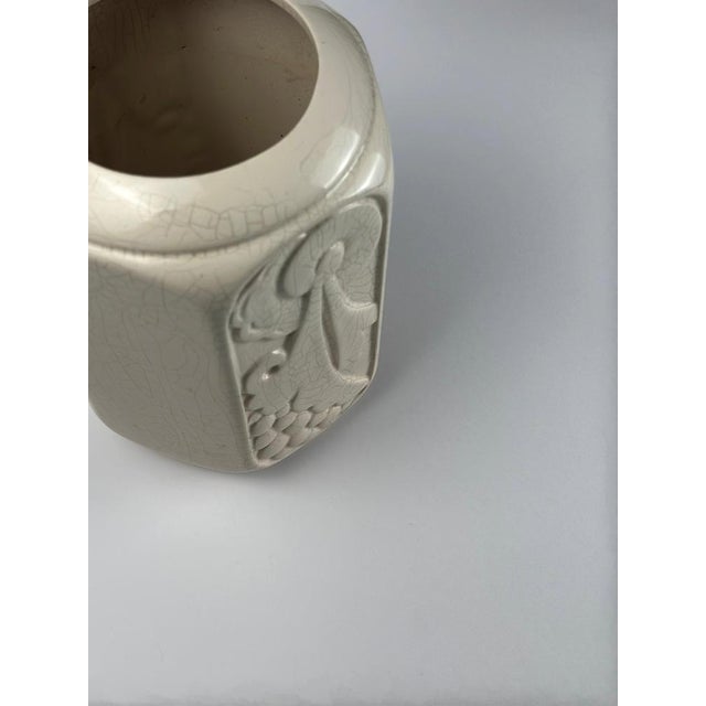 This refined French Art Deco vase dates to the 1930s and is likely produced by the Faïencerie d'Orchies, one of the most...