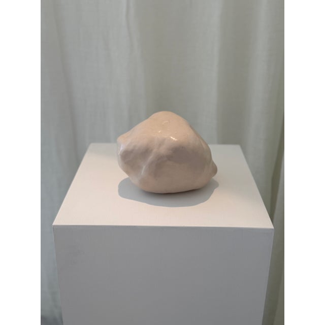 Dimensions: 8.5” w x 7”h Material: stoneware Finishing: unglazed Color: white Edition: one-of-a-kind