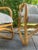 A charming pair of Danish bamboo lounge chairs, circa 1970s, with beautifully curved bamboo frames and soft diamond-...