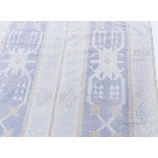 This graceful circa 1955 Indian Dhurrie rug represents the understated elegance and practical artistry of traditional...