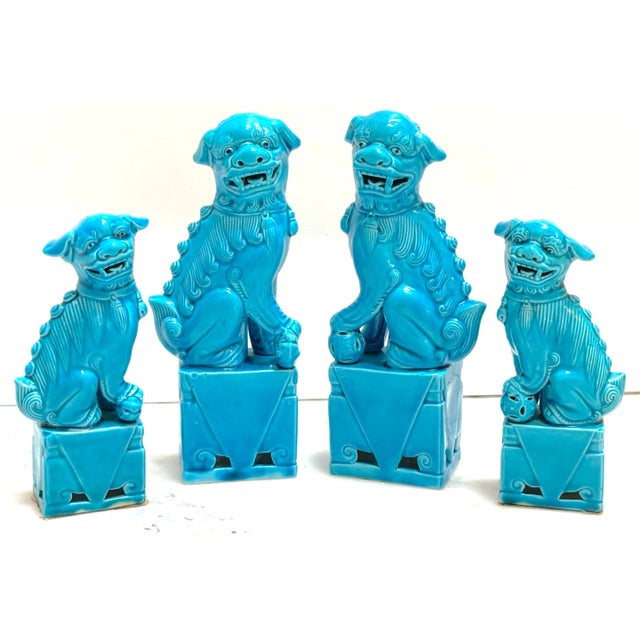 A Collection of Two Pairs of Turquoise Chinese Export Foo Dogs China, 20th century An instant collection of two pairs of...