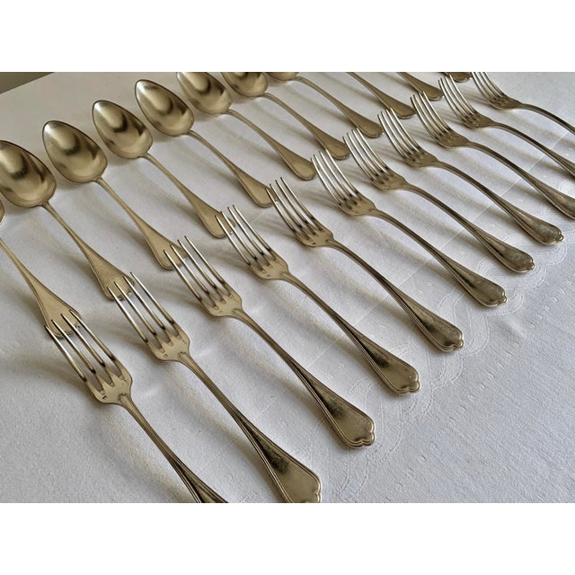 Very beautiful antique silver plated cutlery set with 11 dinner spoons and 11 forks of the brand 'boulenger' this simple...
