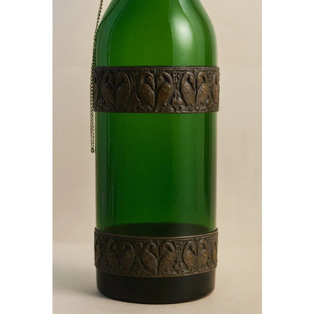 An exceptional emerald green glass decanter, attributed to Moser of Karlovy Vary, Bohemia (now Czech Republic), circa...
