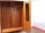 A stunning armoire made in the style of British furniture maker Butilux, this Mid Century Modern Vintage Teak Armoire...
