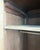 This art deco oak wardrobe combines a three-door front with a carved decoration of fluting and geometric patterns. Its...