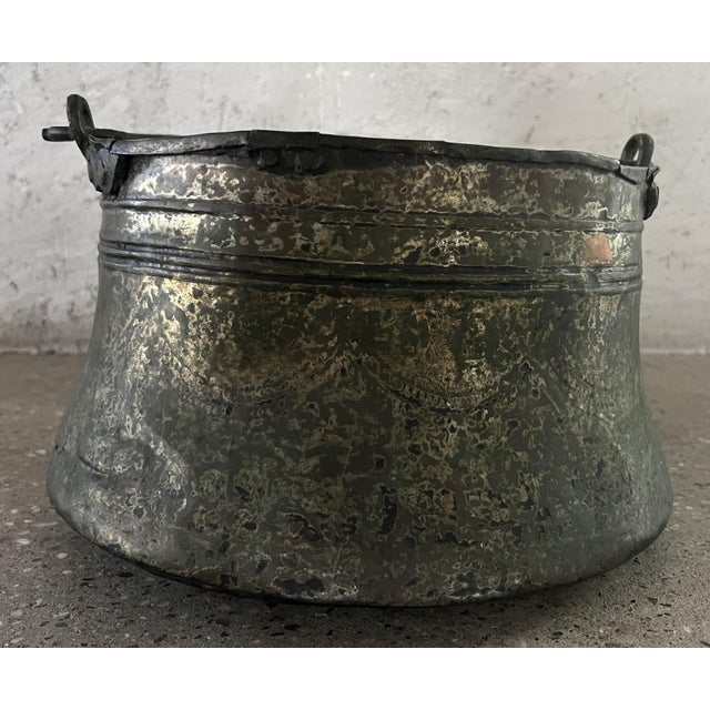 Beautiful handcrafted pot with incredible patina and detail.