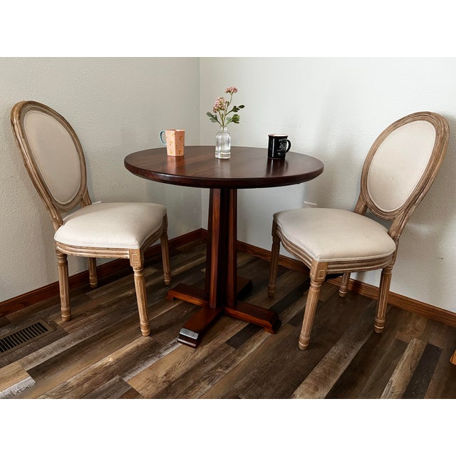 This 32” round country style table is the perfect choice for an apartment or a cozy breakfast nook. It’s built with 300...