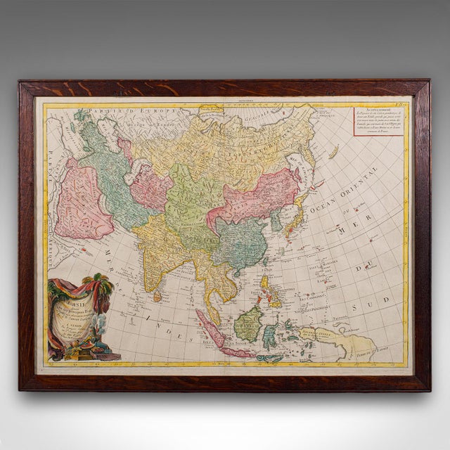 This is an antique map of Asia. A French, framed atlas representation of the continent, dating to the late 18th century,...