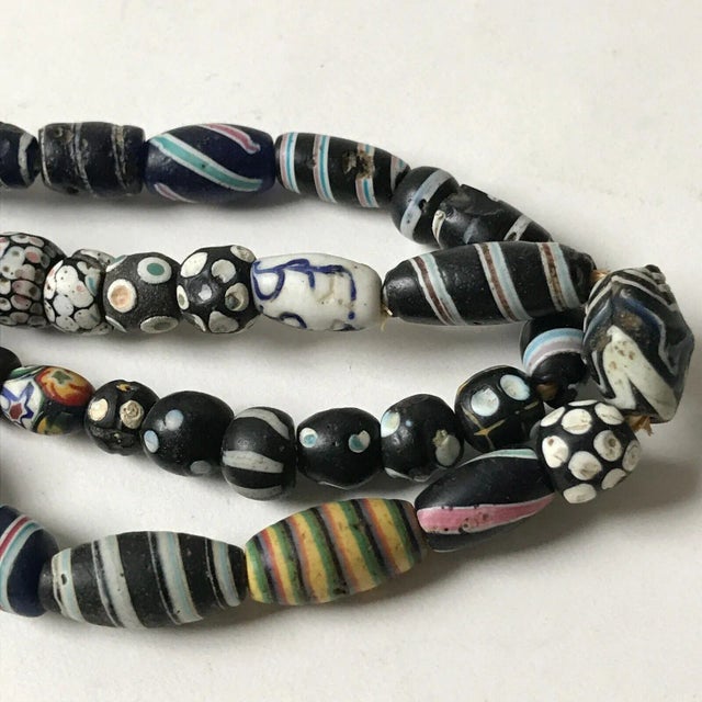 Early 20th Century Venetian Feather Striped Skunk Thousand Eye Millefiori African Trade Glass Beads For Sale - Image 4 of 11