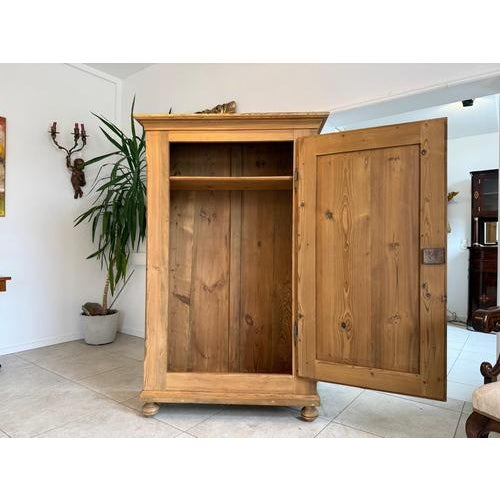 Restored antique farmhouse cupboard, natural wood, from the Biedermeier period. Dimensions: Height x Width x Depth 179 x...