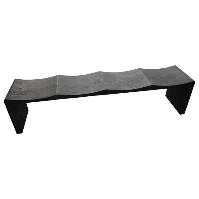 The teak wave bench represents a sleek, modern aesthetic, designed to provide comfort and durability. Solid reclaimed teak...