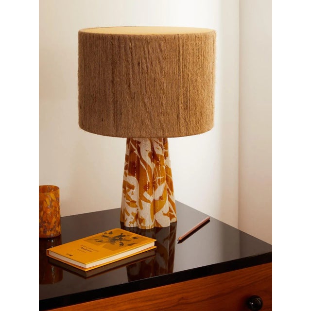 Introducing Stories of Italy stunning Bucket Table Lamp, a true testament to craftsmanship. The lamp's base, made from...