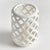 Expertly crafted from hand cut ceramic strips, and finished in a brightWhite glaze, this hurricane lets all the light...
