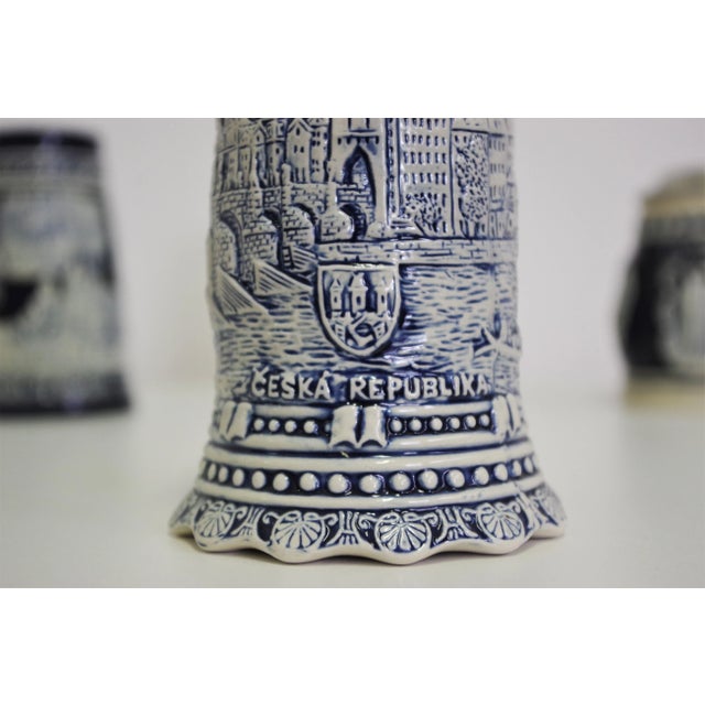 Porcelain mugs, made in west germany 80 the measures of the mugs are: h15 x l13 x p10 x h15 x l12,5 p9