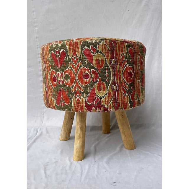Add warmth, texture, and artisan charm to your home with this beautifully handcrafted vintage Kilim Ottoman Stool....