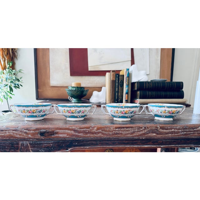 Beautiful set of four vintage Crown Staffordshire double-handled bouillon or cream soup cups in the Lyric Tunis Blue...