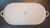 Festive serving platter in bright white ceramic with bright multi-colored pattern of birds and flowers. 16.5 inches by 8.5...