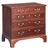 A fine English small chest or dresser cabinet of patinated mahogany from the Georgian period, featuring a moulded top over...