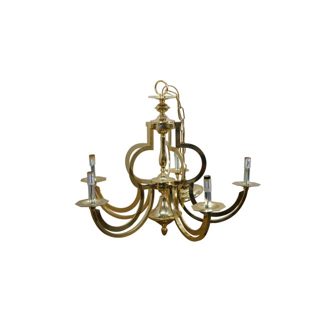 Vintage polished brass chandelier with distinct geometric Hollywood Regency and Art Deco design elements. A central column...