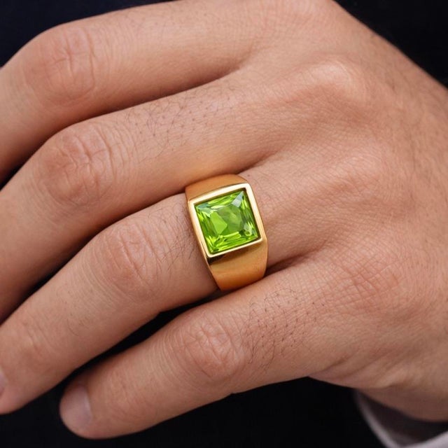 Square Peridot Signet Ring in Gold Vibrant and commanding, this ring features a striking square-cut peridot set seamlessly...