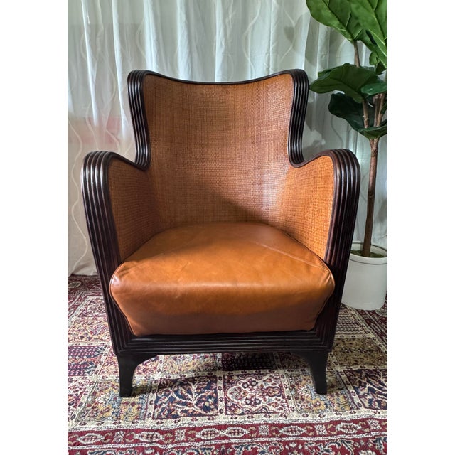 This sculptural mid-century modern lounge chair features a beautifully executed bentwood frame with layered detailing,...