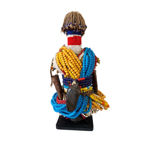 Superb vintage African &nbsp; Namji twin fertility dolls adorned with multiple layers of trade glass beads leather strips...