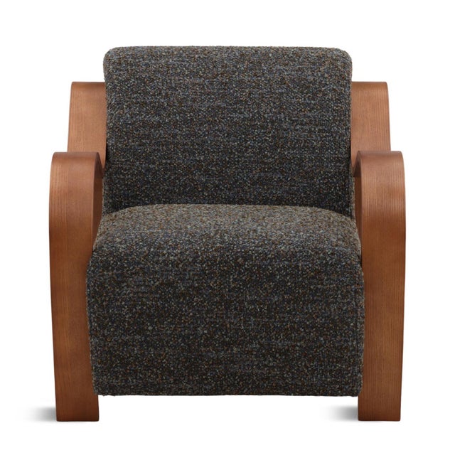 Boucle upholstered arm chair with textured pattern cerulean and brown multi-tone coloring. Curved ribbon-like oak wood...
