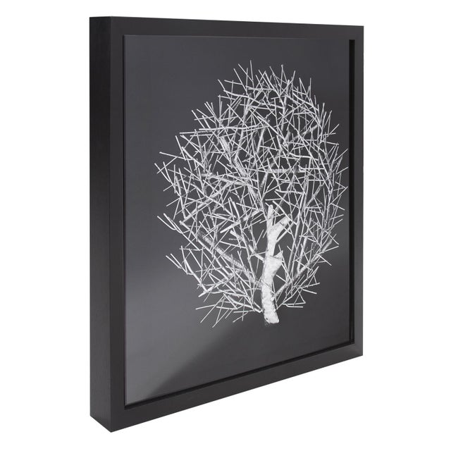 Spanish for tree, our Arbol Wall Art captures the beauty of a tree in this abstract rendition. A white tree is set on a...