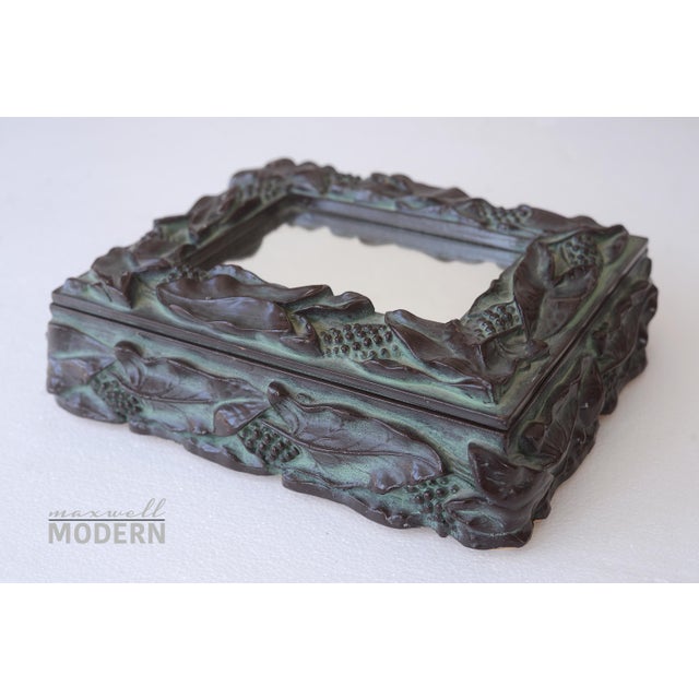 Gorgeous vintage Art Nouveau style trinket box made of molded lacquered resin depicting relief botanical details with a...