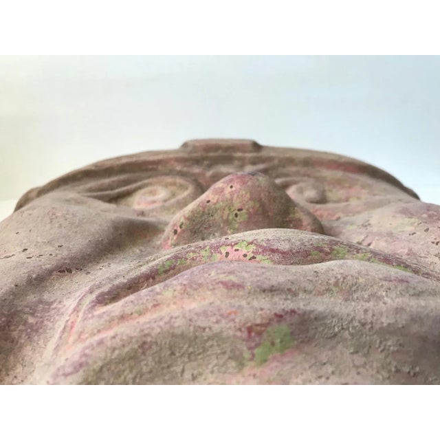 Large (46x43x10 cm) raw terracotta wall mask of an Olmec Warrior. The Olmec's was a pre-culumbian, Mesoamerican tribe that...