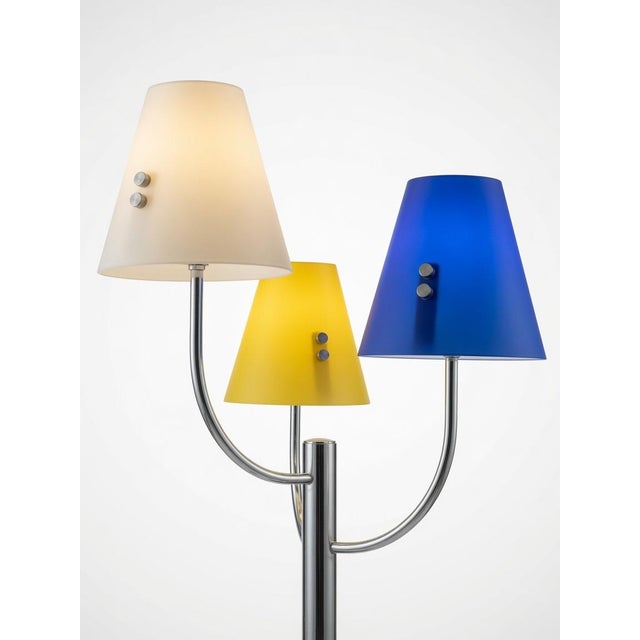 Vintage Italian Three-Arm Chrome Floor Lamp by Di Lo Bosco Art. 3232/PT3 – Cusano Milanino, Italy A striking vintage...