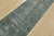 An authentic vintage traditional Tabriz runner hand-knotted with fine wool on a cotton foundation. This rug features a...
