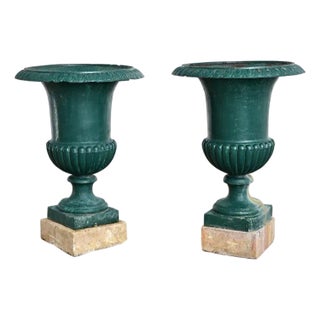 French 19th Century Pair of Cast Iron Urns on Stone Bases For Sale