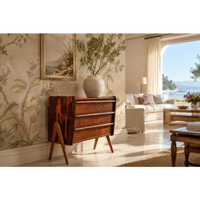 A striking example of Brazilian Modern design, this rare chest of drawers was produced by Cimo and crafted in richly...