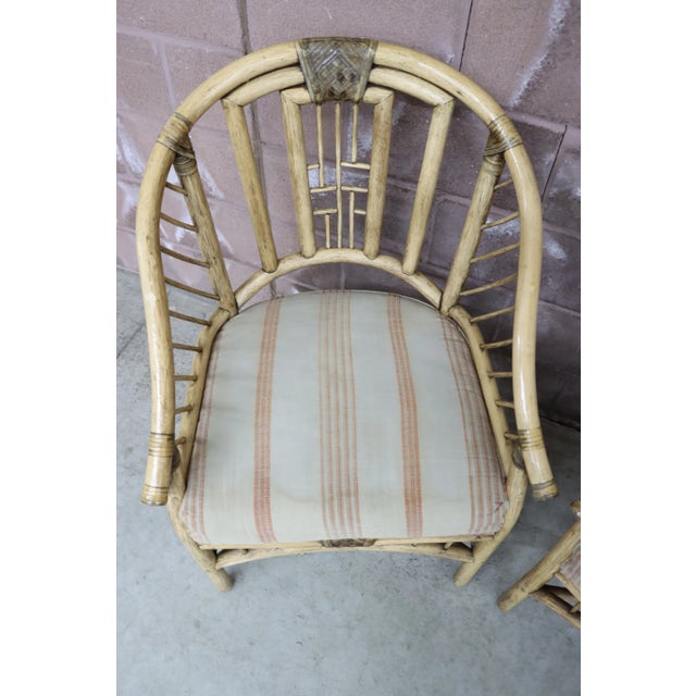 J. Williams mid century style arm chairs in bamboo style frames, appropriate for dining or lounge area.