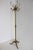 Elegant Italian brass coat rack dating from the 1960s, featuring a beautifully detailed rotating crown, decorative hooks,...