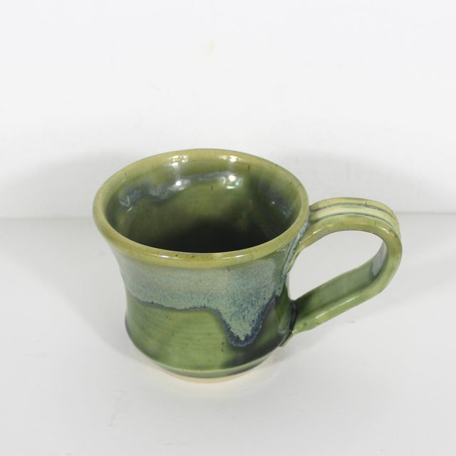 Elevate your morning cup with this unique, handmade vintage artisan studio pottery mug. This mug is truly charming. It is...