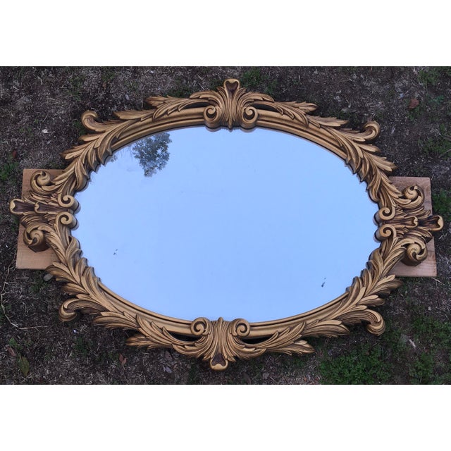 Beautiful Rococo Hollywood regency style vintage gold resin (plastic) framed mirror. Turner style. Brand unknown....