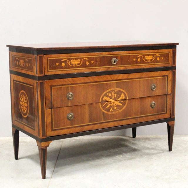 Louis XVI chest of drawers with three drawers In walnut, elegantly inlaid and trimmed with walnut veneer Late 18th century...