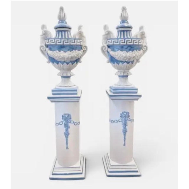 Make a grand statement with this commanding pair of vintage Italian glazed ceramic lidded urns on matching pedestals....